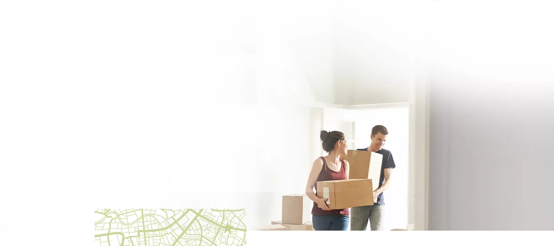 Couple moving boxes into new place